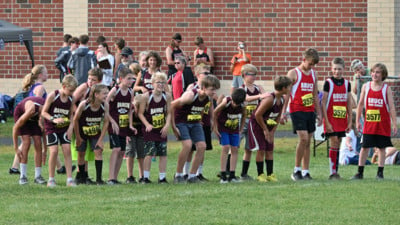 Cross country runners line up