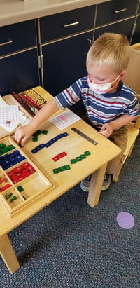 The stamp game can be used for addition, subtraction, multiplication, and division at a young age.
